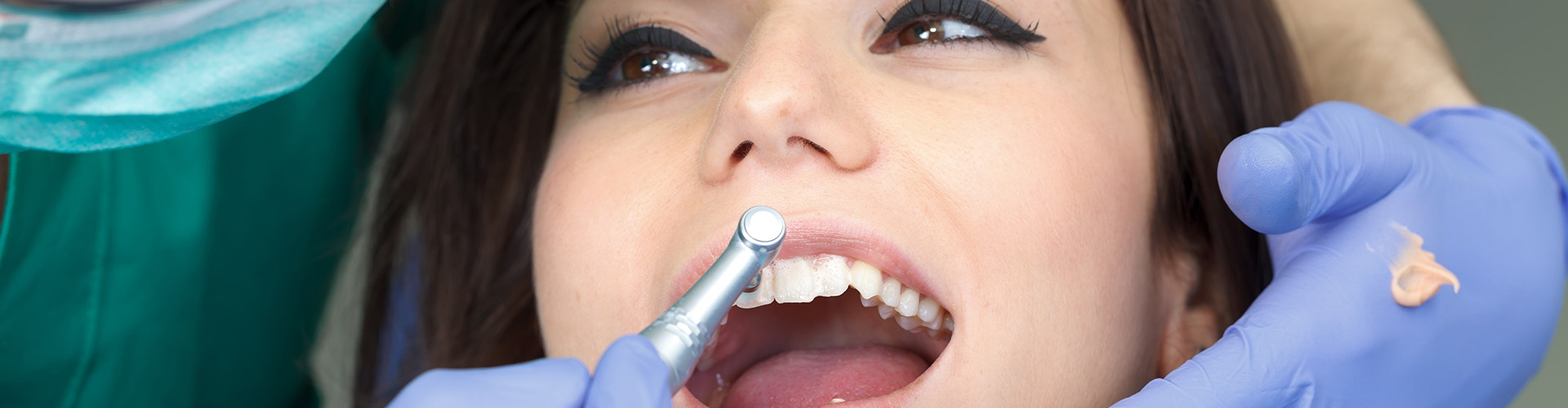 Woman having her teeth cleaned.